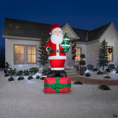 10' Plush Santa Claus Standing On Present by Gemmy Inflatables