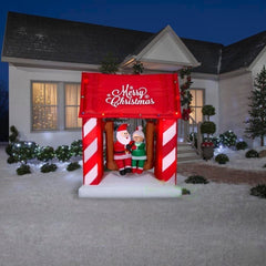 7' Santa & Mrs. Claus Sitting On Porch Swing Scene by Gemmy Inflatables