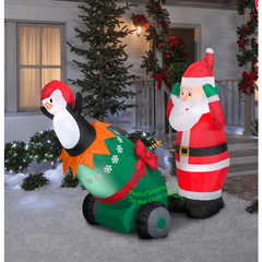 6' Lightshow Santa and Penguin Cannon Scene by Gemmy Inflatables