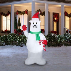 7' Christmas Polar Bear Wearing Santa Hat Holding A Candy Cane by Gemmy Inflatable