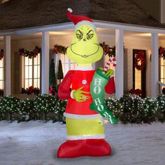 9' Dr. Seuss' The Grinch w/ HO HO HO Stocking by Gemmy Inflatables
